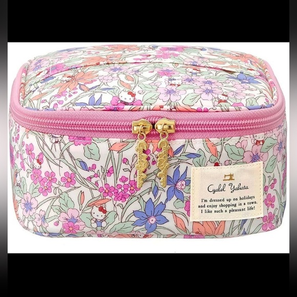 Sanrio Handbags - Sanrio Floral Hello Kitty Cosmetic Case in Pink, White, Purple